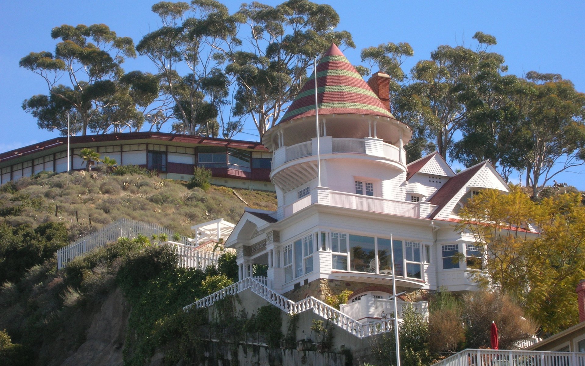 Holly Hill House and its rounded tower on an Avalon hillside