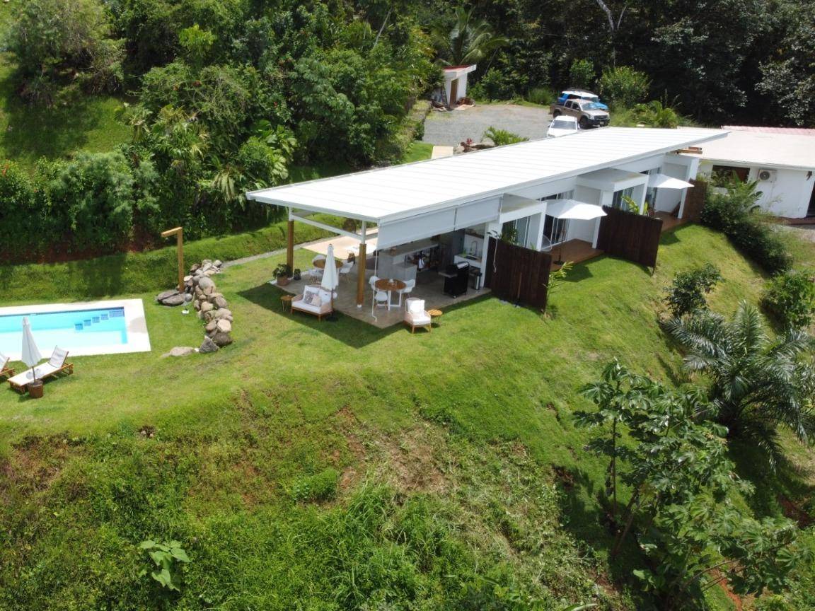 Terra Lodge - Income producing property with two apartments, swimming pool and 1 bedroom home.