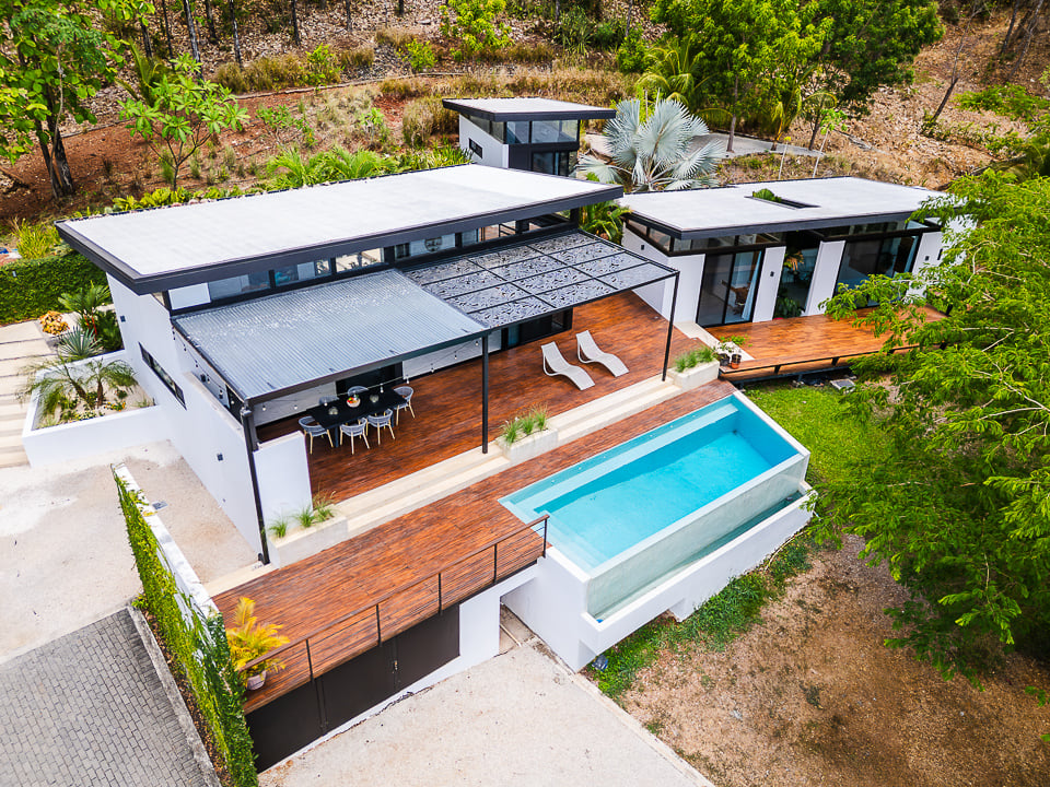 Casa Kalachuchi | Gorgeous Modern Jungle Oasis with Sunset Views in Gated Community