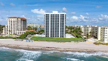 Beachfront condominiums along the East Boca shoreline, with ocean waves and sandy beach.