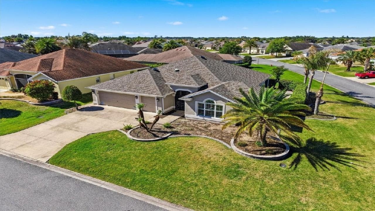Wait, this Villages home has TWO master suites AND a golf cart garage?