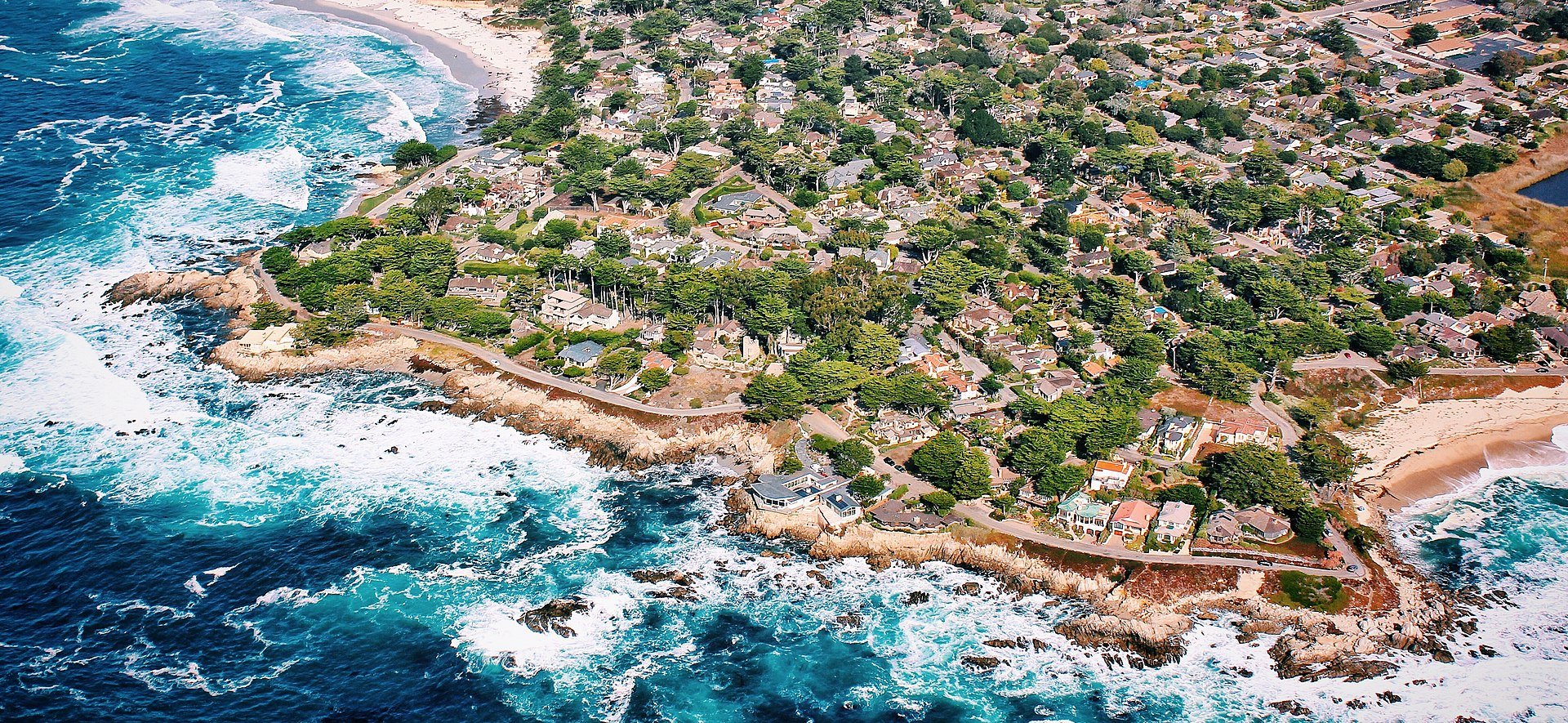 Dramatic Carmel-by-the-Sea coastline with rugged cliffs and Pacific Ocean waves - luxury coastal day trips from San Francisco