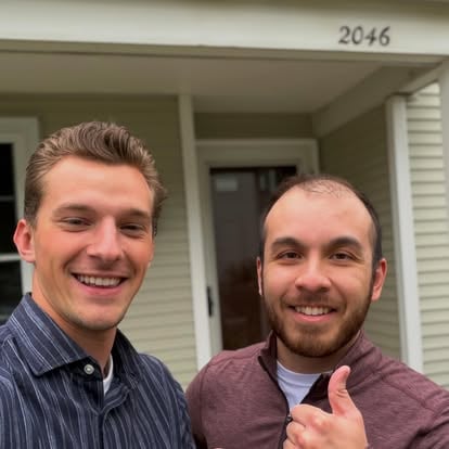Aaron sharing a thumbs-up with a client