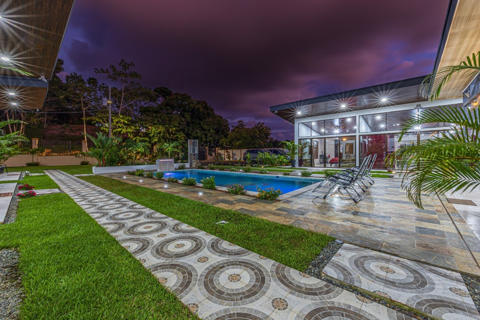 Incredible turnkey investment opportunity, 3 Rental villas, and a 2 Bedroom Home with a large pool.