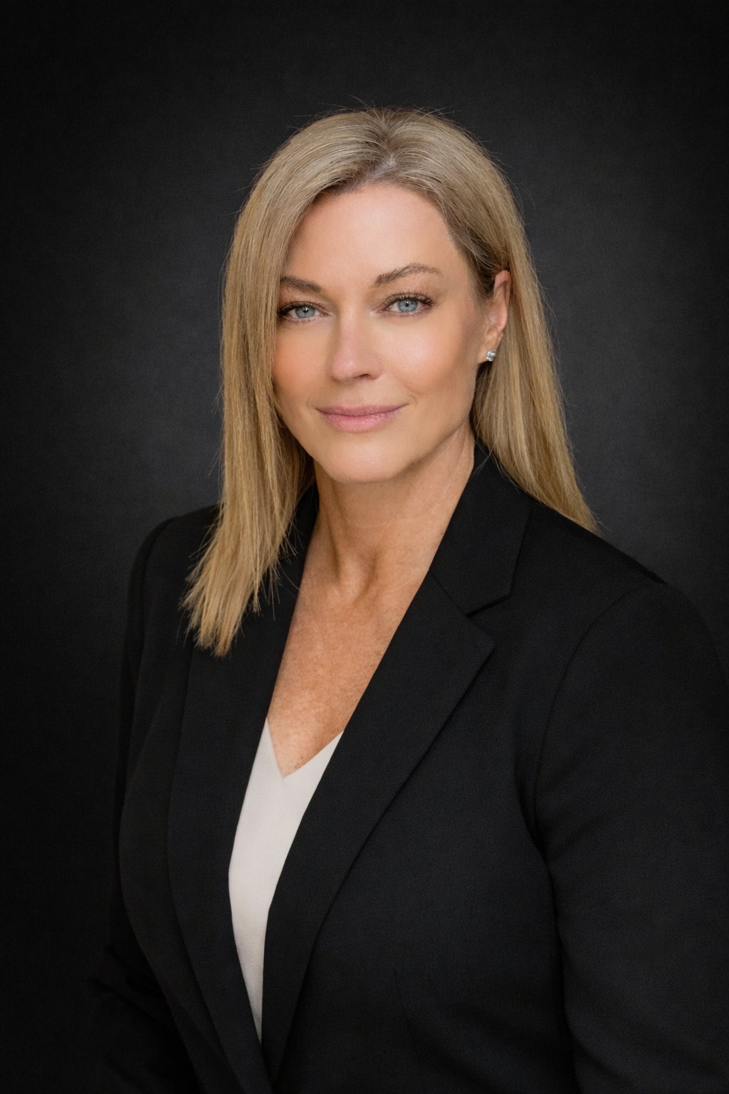 Professional headshot of Paula Higman, luxury real estate advisor serving Park City and Deer Valley, Utah.