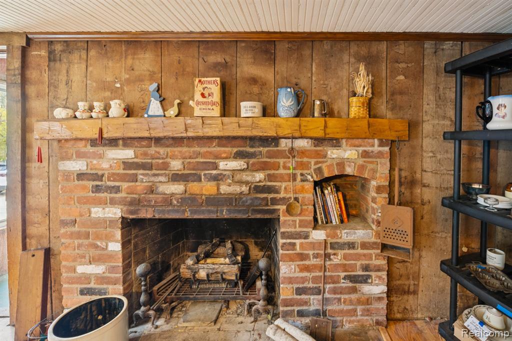 Living area in the 4-bedroom home for sale at 13278 9 Mile Road, South Lyon, MI,