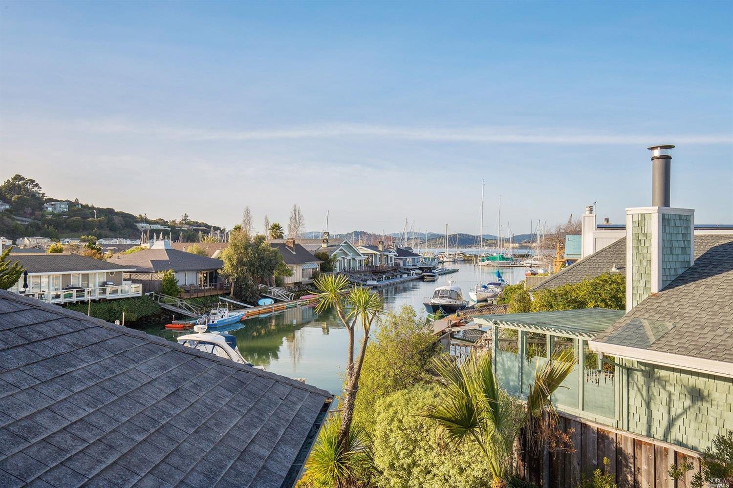 Dramatic Waterfront Home with Private Boat Slip- Represented Buyer