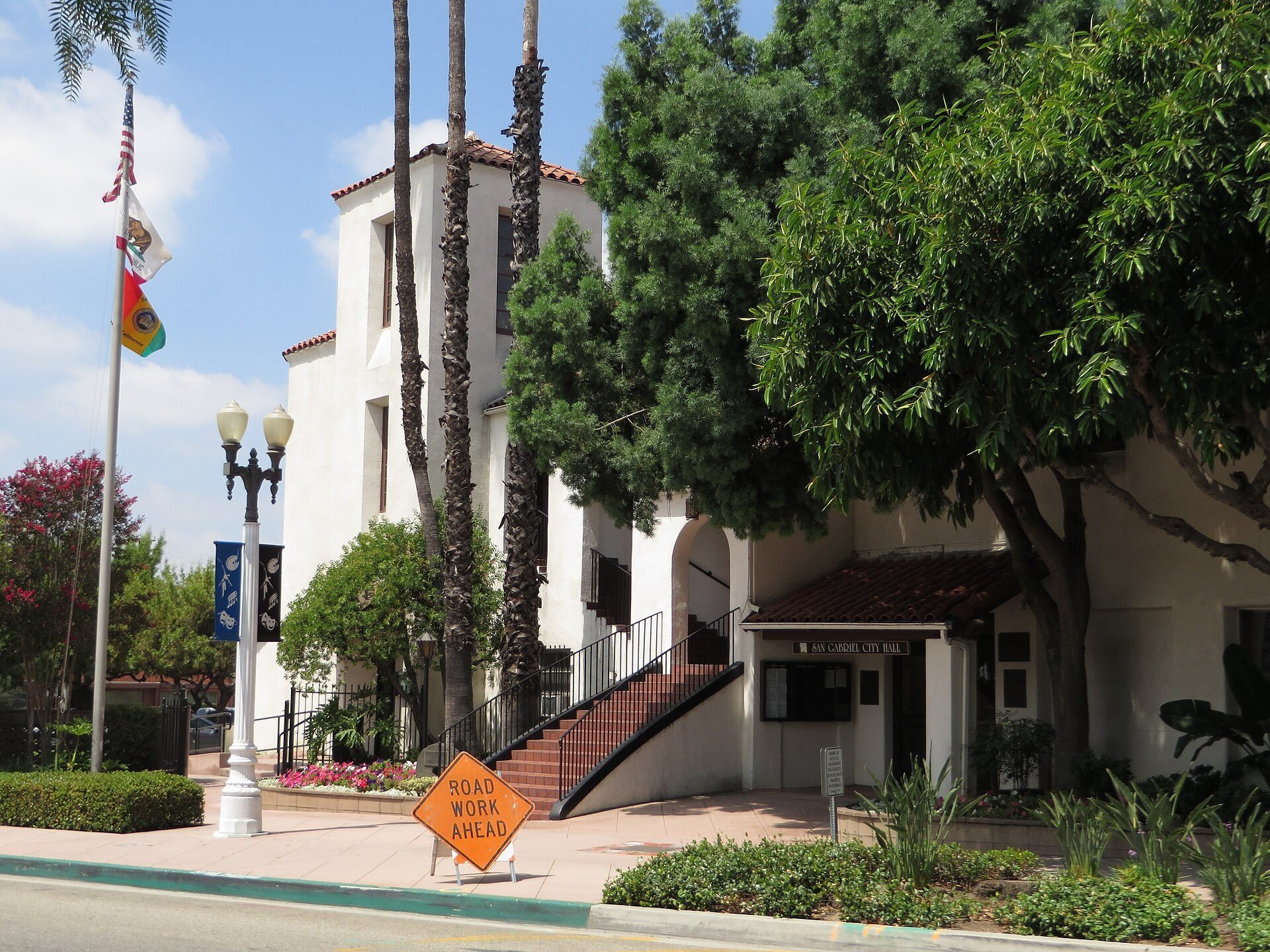 San Gabriel City Hall exterior with palms and trees, photographed June 2014