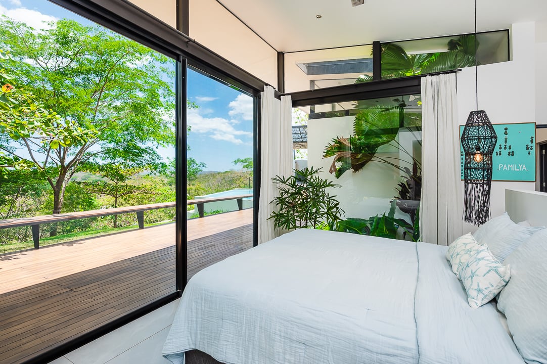 Casa Kalachuchi | Gorgeous Modern Jungle Oasis with Sunset Views in Gated Community