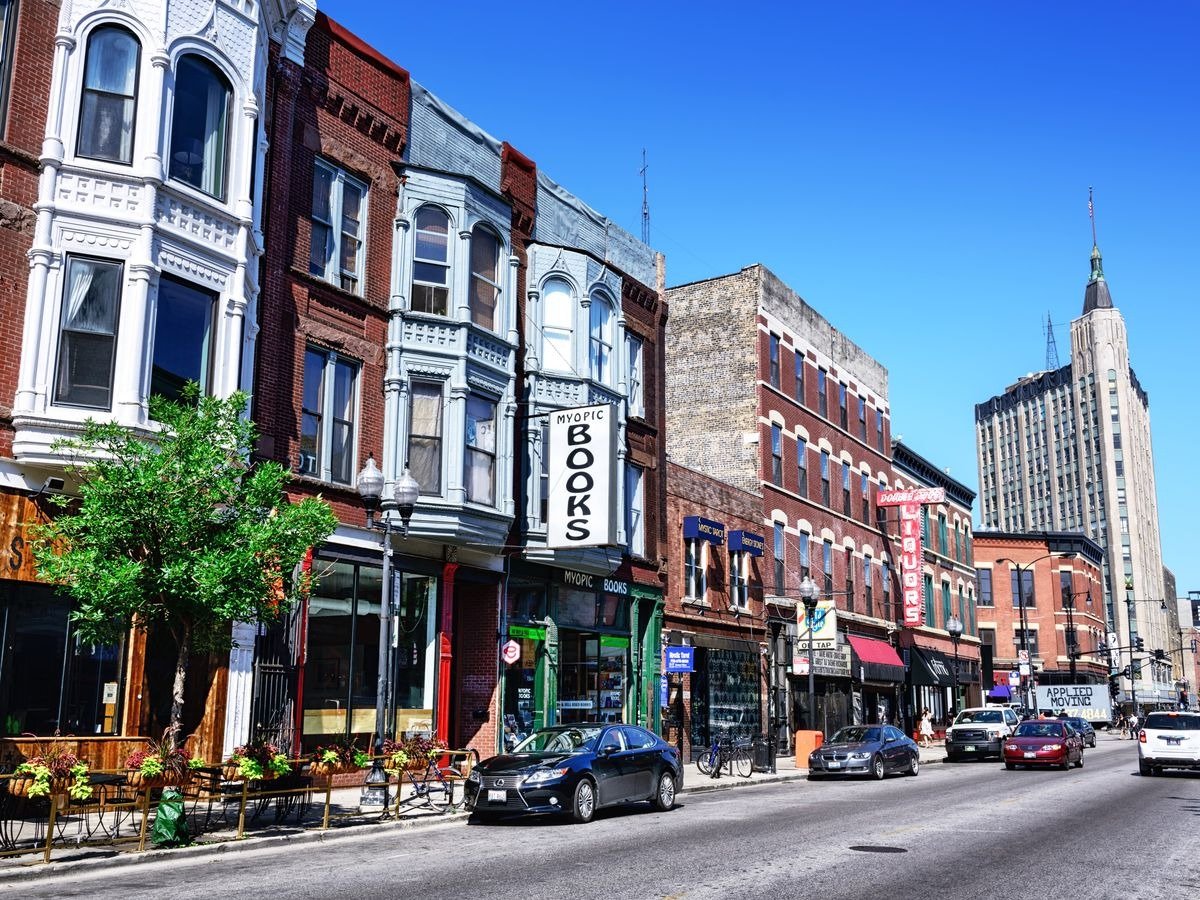 Shopping and restaurants along Milwaukee Avenue in Bucktown, with the Robey Hotel in the background