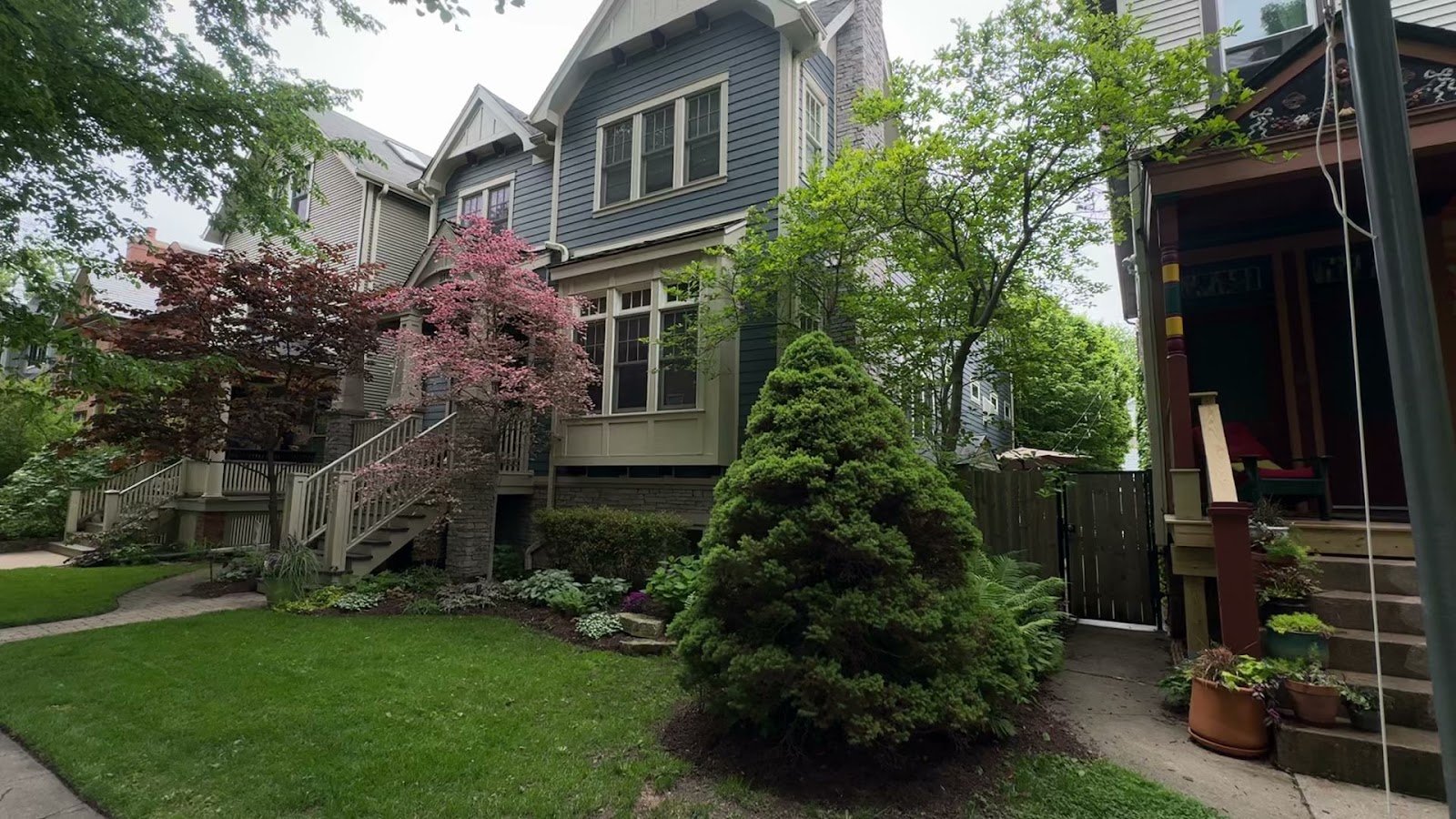 Vintage homes with front lawns and gardens on a Lincoln Square, Chicago street