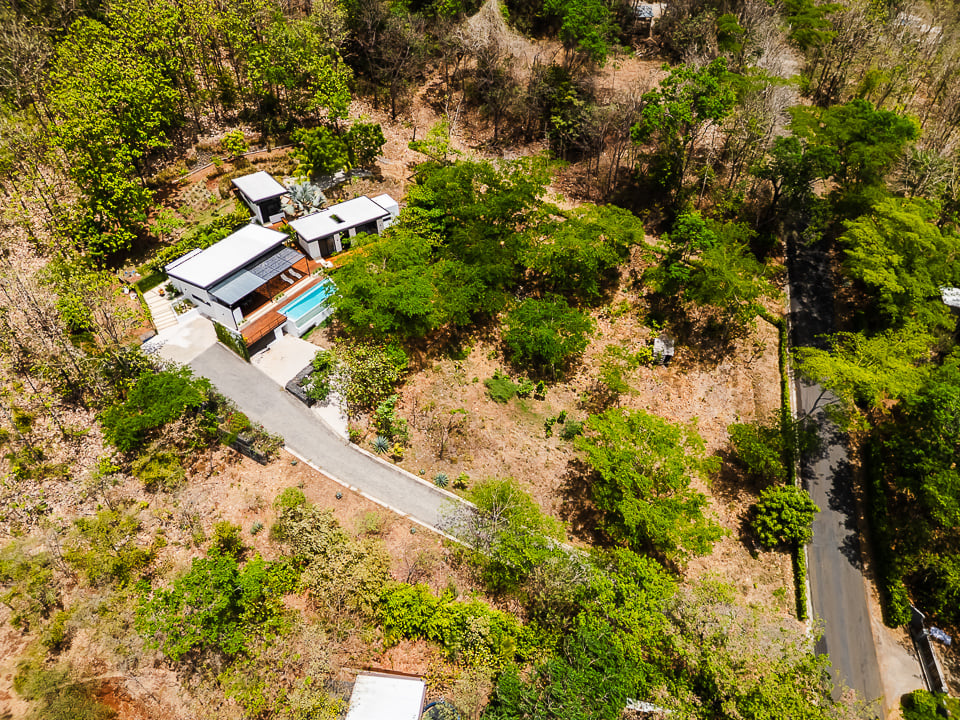Casa Kalachuchi | Gorgeous Modern Jungle Oasis with Sunset Views in Gated Community