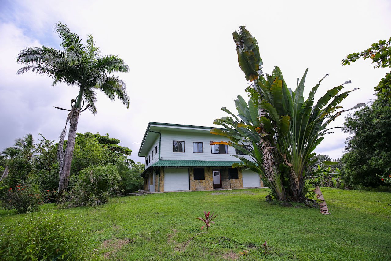 HOME AND APARTMENT WALKING DISTANCE TO THE BEACH – 1.3 ACRES