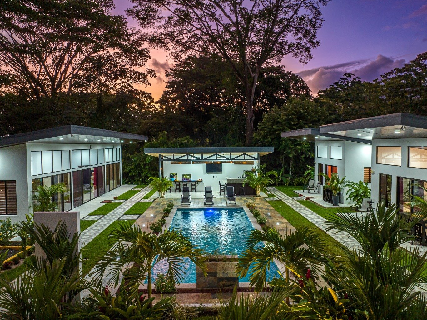 Incredible turnkey investment opportunity, 3 Rental villas, and a 2 Bedroom Home with a large pool.