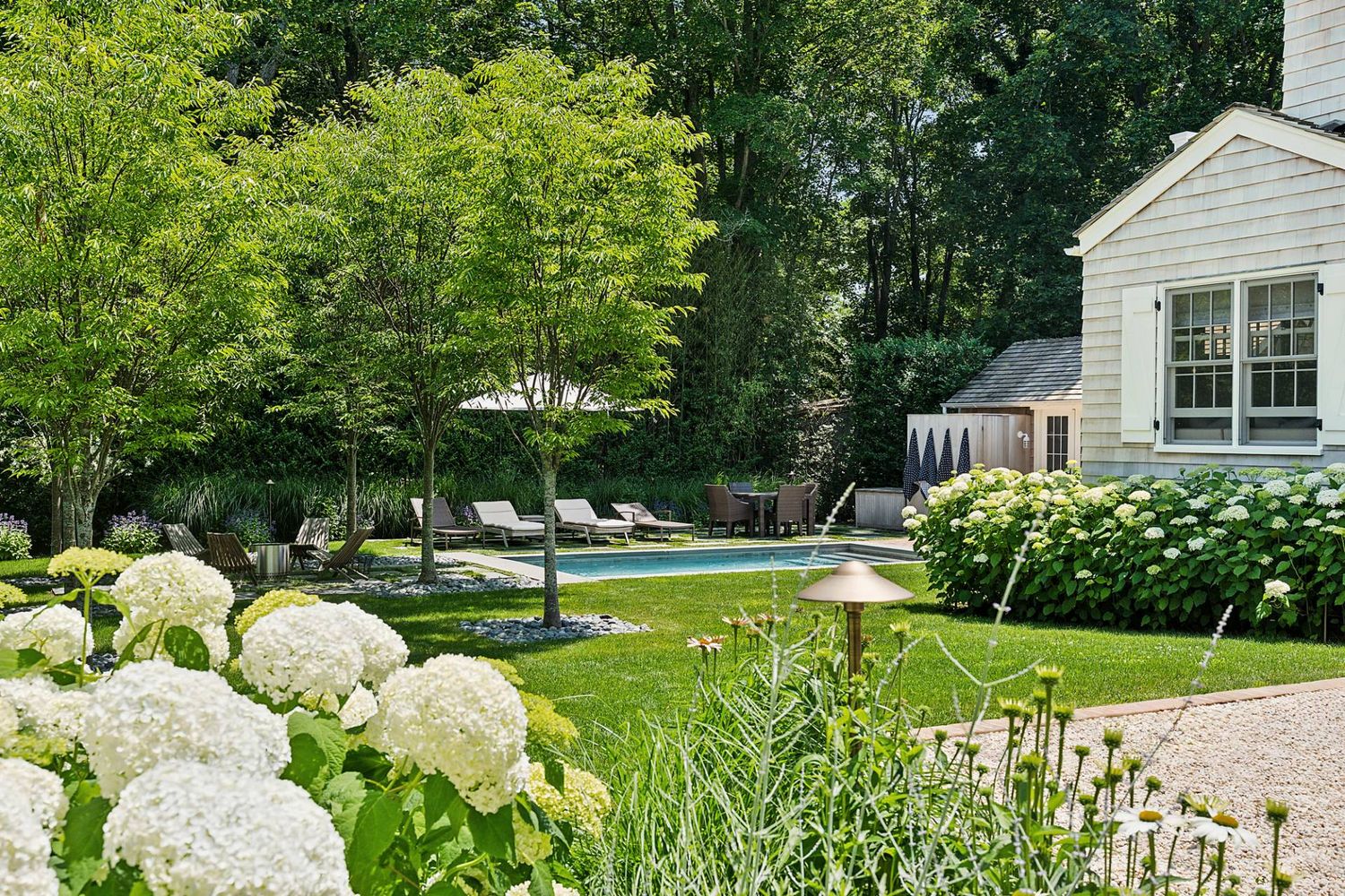Modernized Vintage Cottage with Knockout Backyard, Moments to Village Main