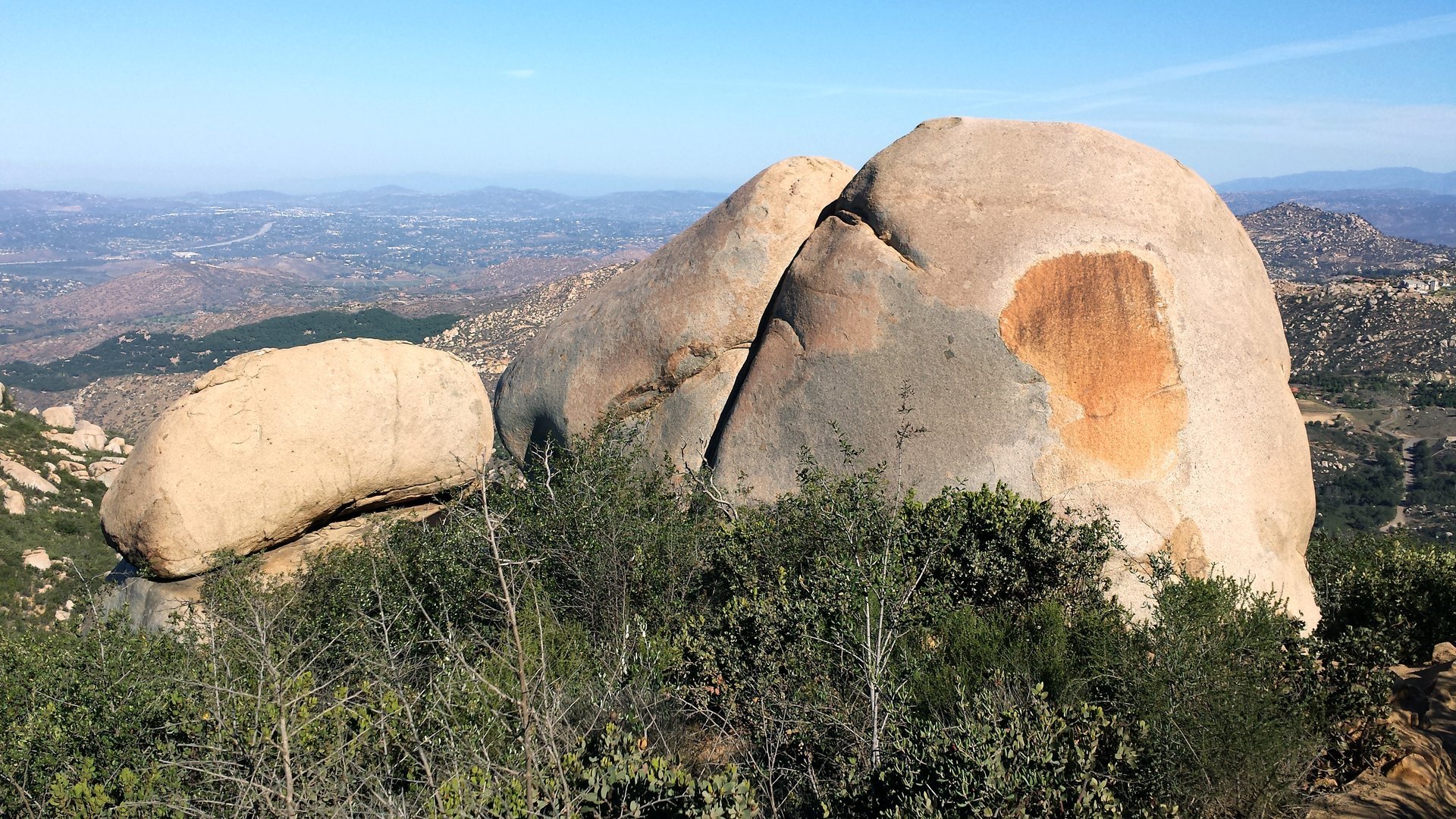 Granite boulders along the Mount Woodson Trail above Poway with the valley and coastal plain in the distance, September 2015