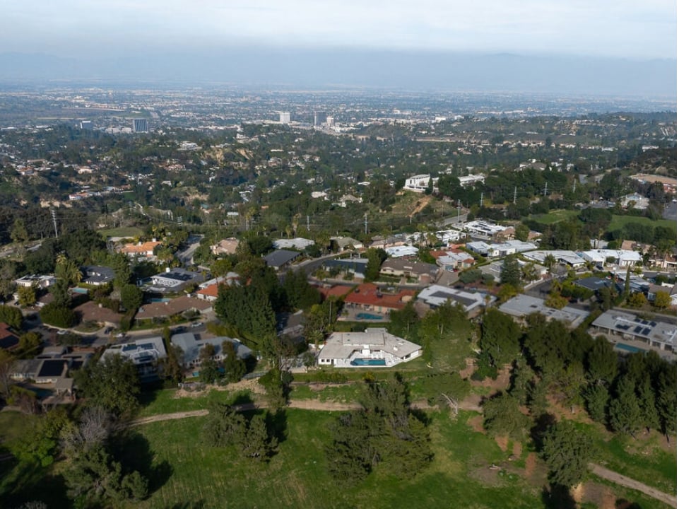 Aerial view of Brentwood homes and hills, looking toward the Westside of Los Angeles