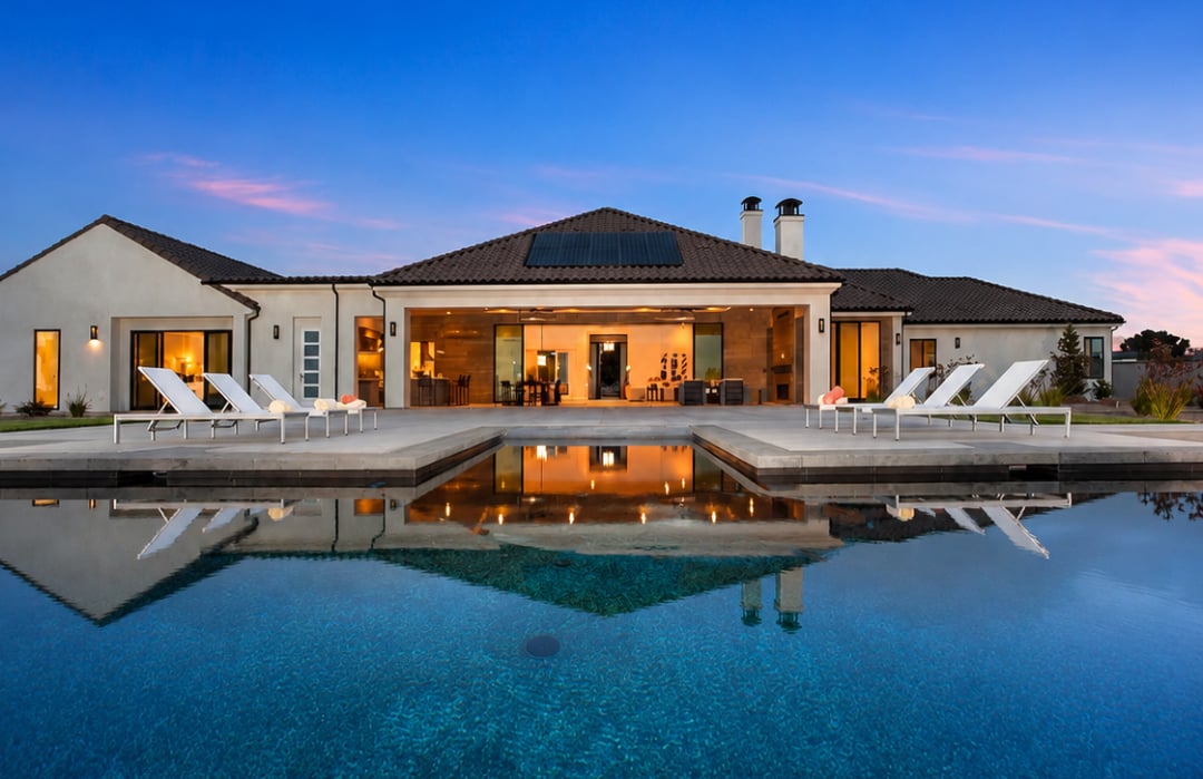 16740 Calle Montana at twilight, an Artesian estate in San Diego sold off market by Luxury Coast Group | Barry Estates