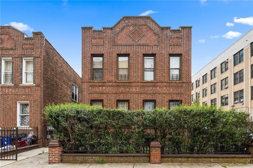 Detached 4-family building at 1088 Lenox Rd Brooklyn sold by The Parviz Team at Compass.