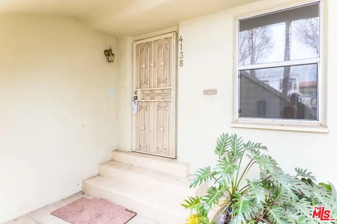 LEIMERT PARK SPANISH COLONIAL DUPLEX