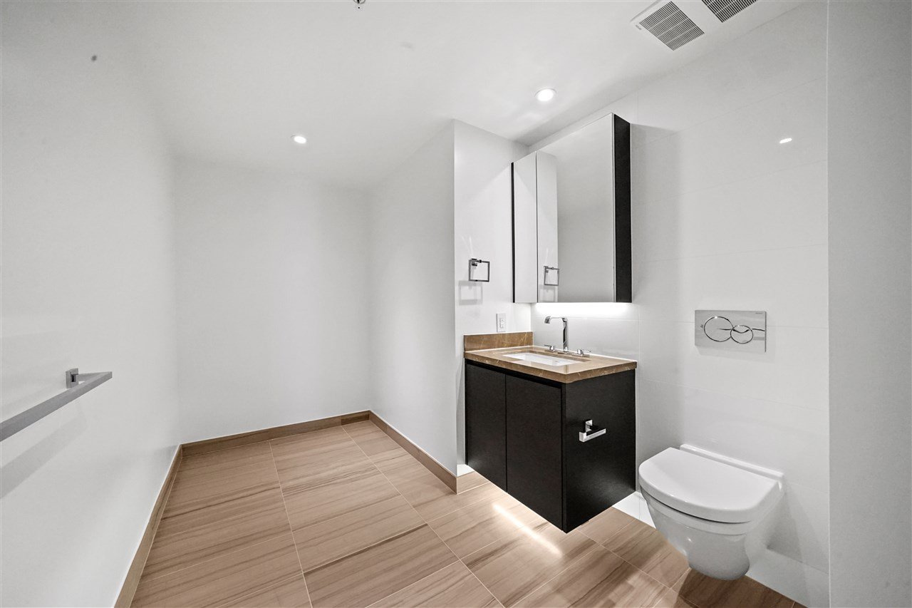 203-7128 Adera St