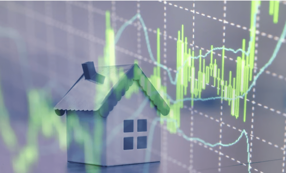 Model house beneath glowing green housing-market charts.