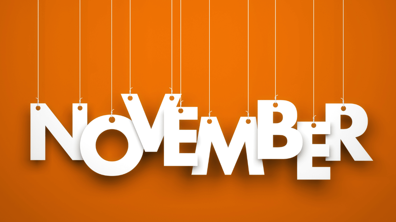 The word "November" written in large white letters against an orange background.