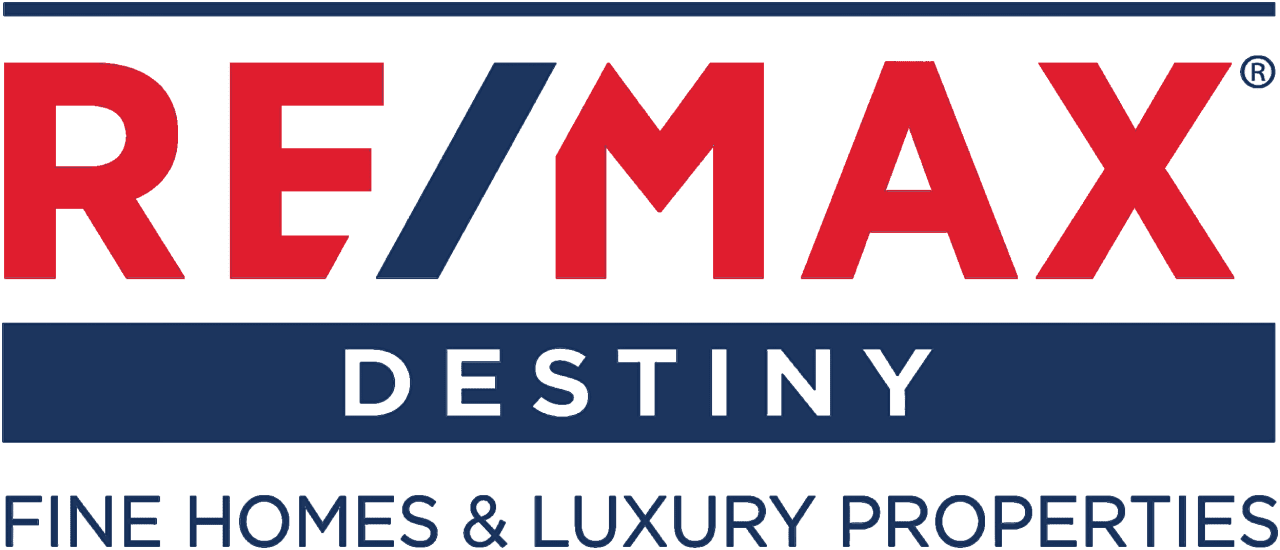 Blue and red colored logo of real estate team RE/MAX Destiny.