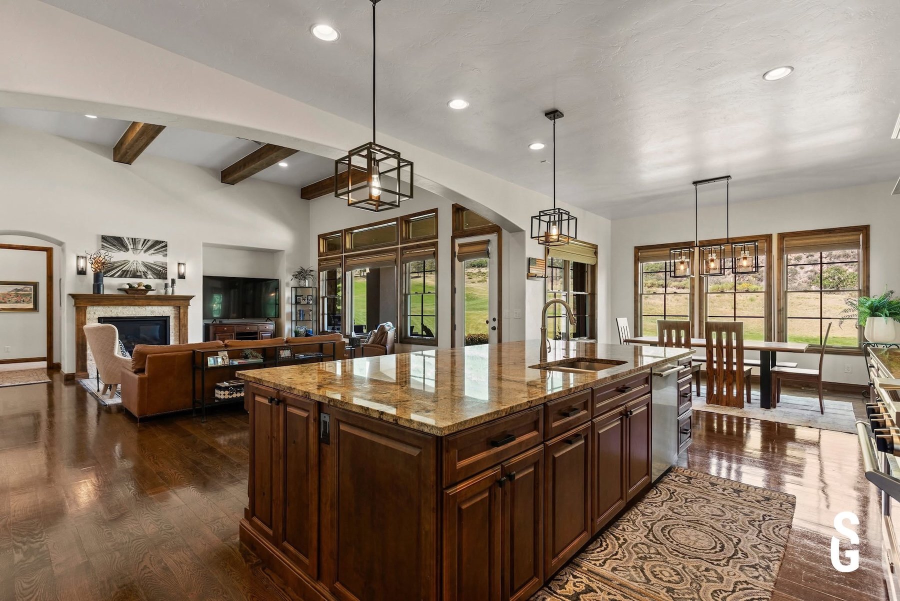 Modern gourmet kitchen with oversized island in a Colorado luxury home