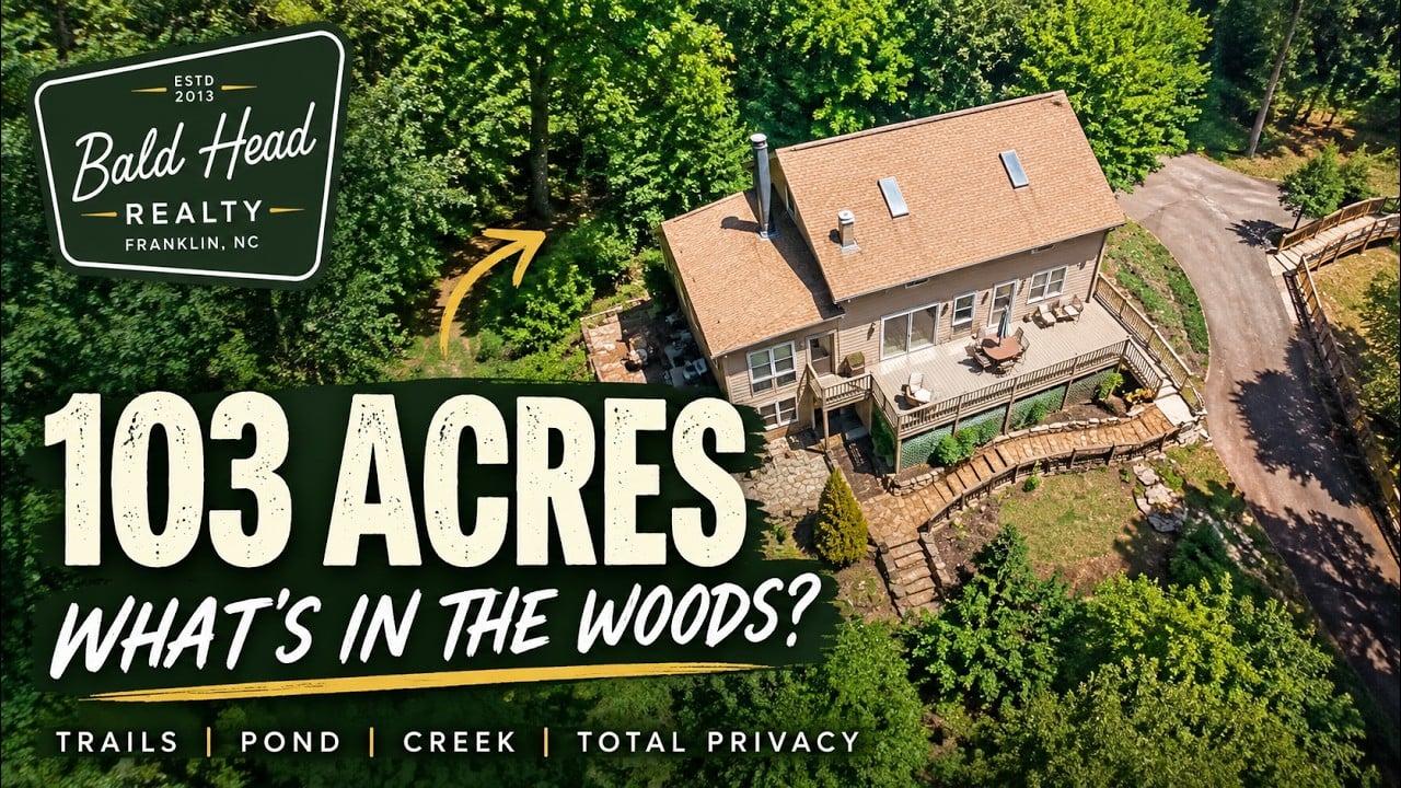 Bald Head Realty vlog thumbnail showing a wooded 103-acre property and house, promoted for its trails, pond, creek, and privacy.