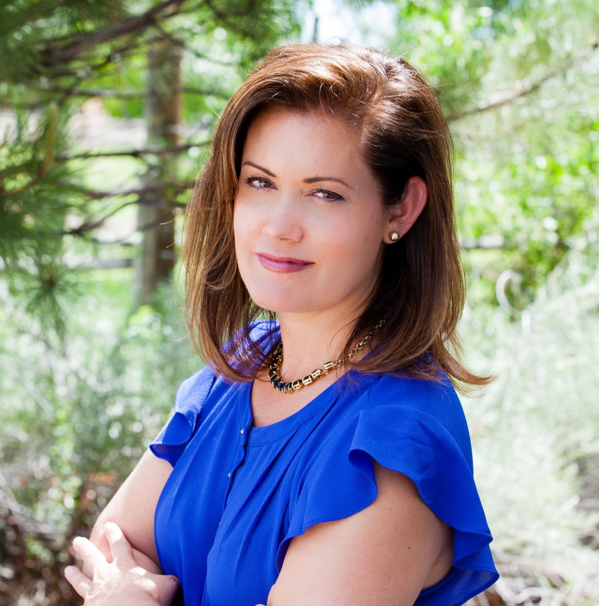 Cassie Sheets Listings.com real estate agent headshot