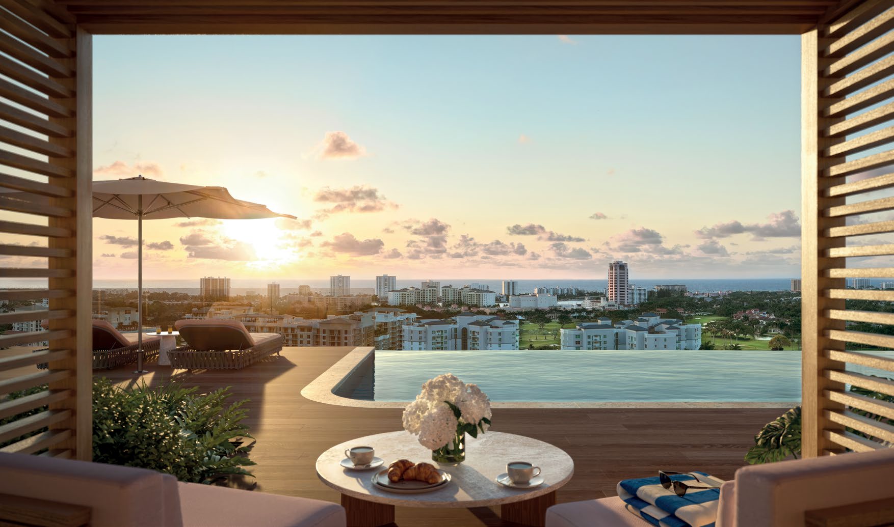 Rendering of a rooftop terrace at sunset overlooking downtown Boca Raton