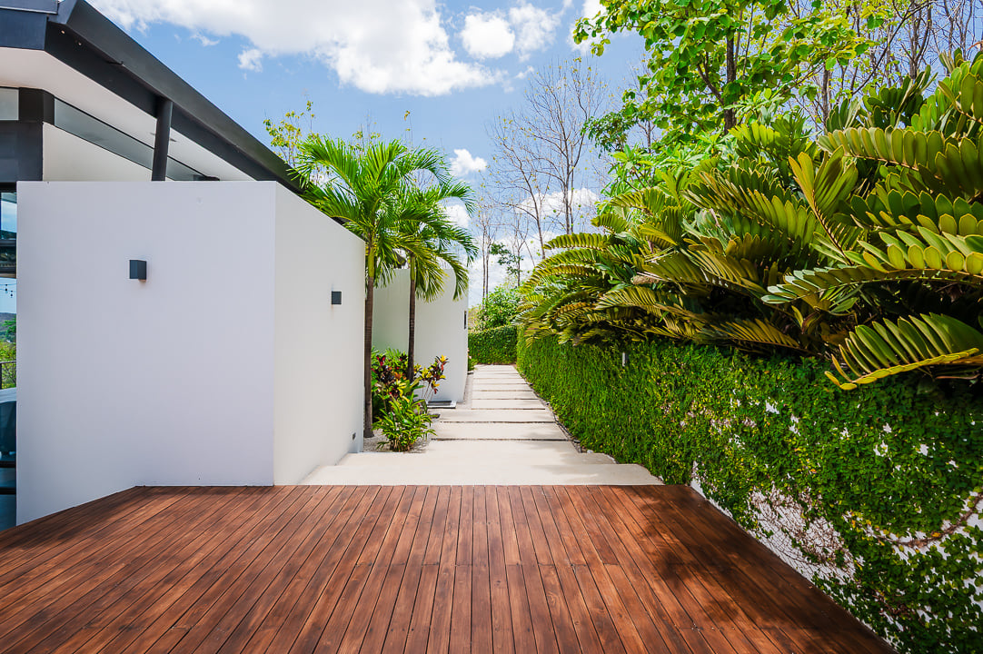 Casa Kalachuchi | Gorgeous Modern Jungle Oasis with Sunset Views in Gated Community