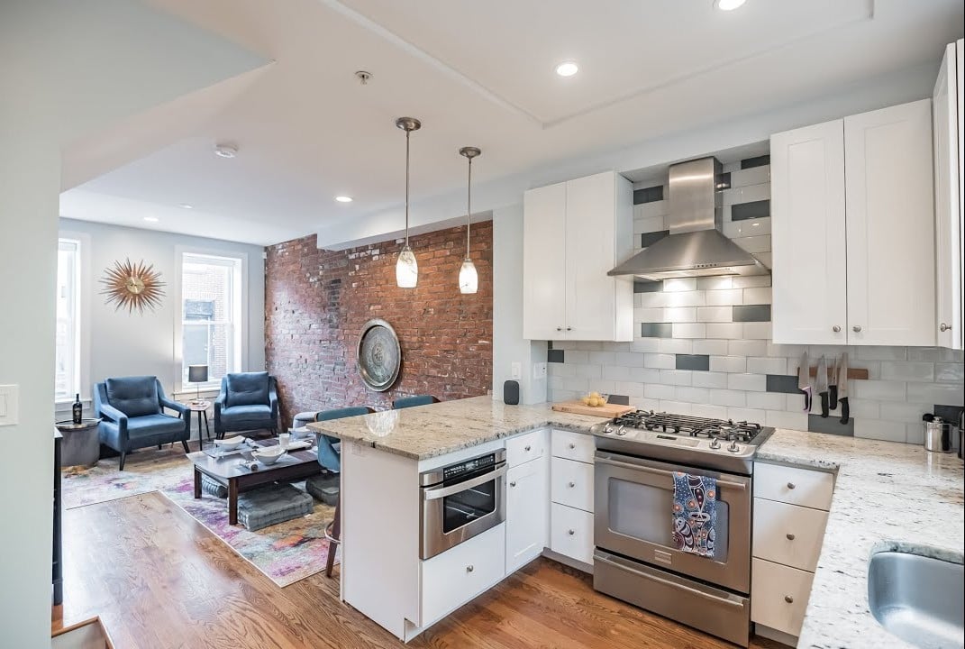 Philadelphia Home for Sale with exposed bricks & Stone. Roof Deck and views in Center City