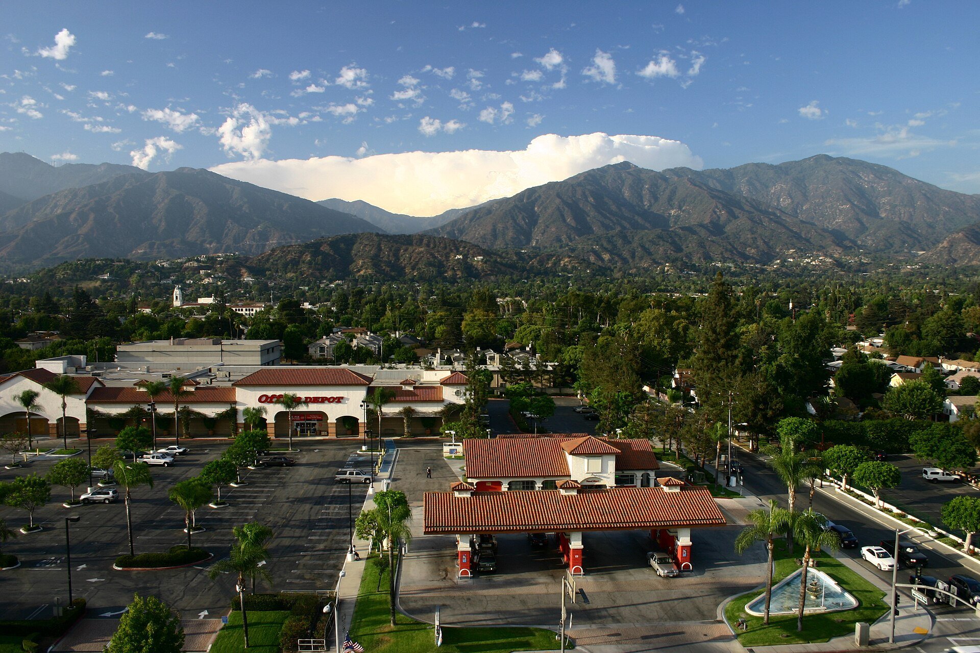 Monrovia rooftops and commercial corridor with the San Gabriel Mountains beyond