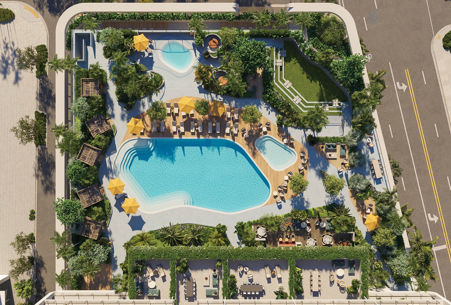 Aerial view of a residential amenity deck with a large pool, smaller pool, and landscaped garden.