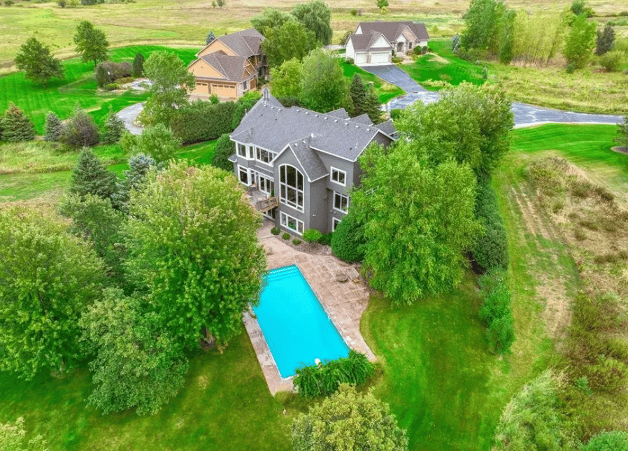 This Gurtek Custom Homes estate offers luxury, privacy, and an easy Twin Cities commute.