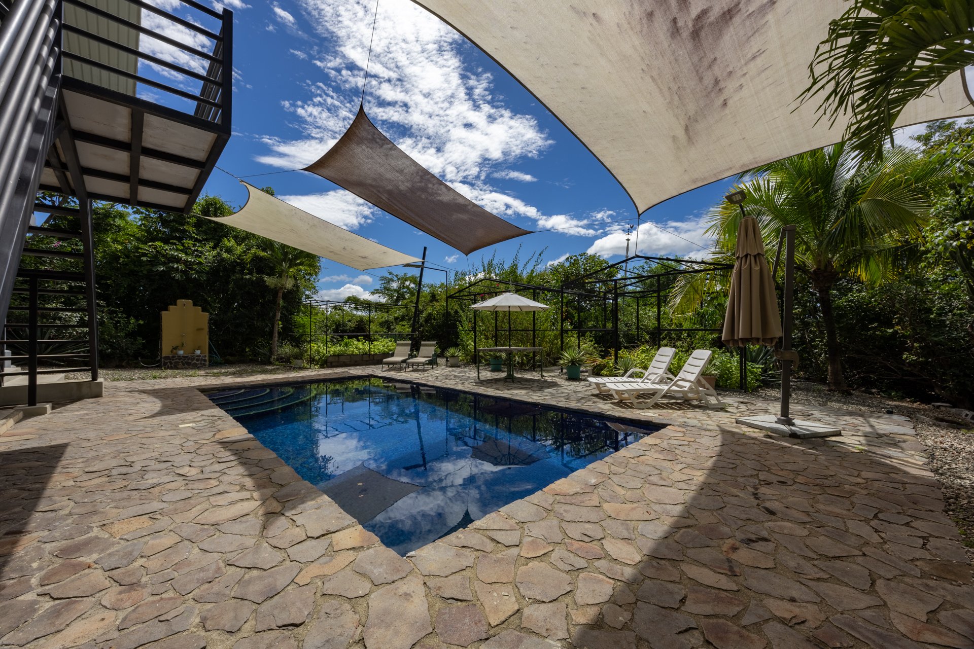 Casa Brillante & Casita Cinco Playas | Modern Home with Guest Casita, Pool & Mountain Views in Huacas