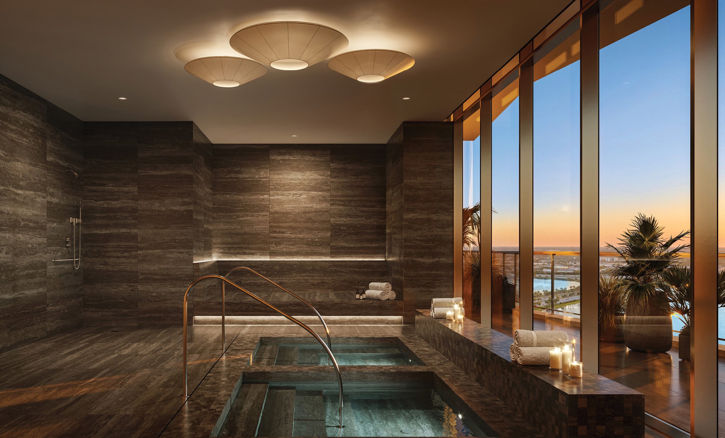 Rendering of the spa at The Berkeley with indoor pools, dark stone and floor-to-ceiling windows over the water