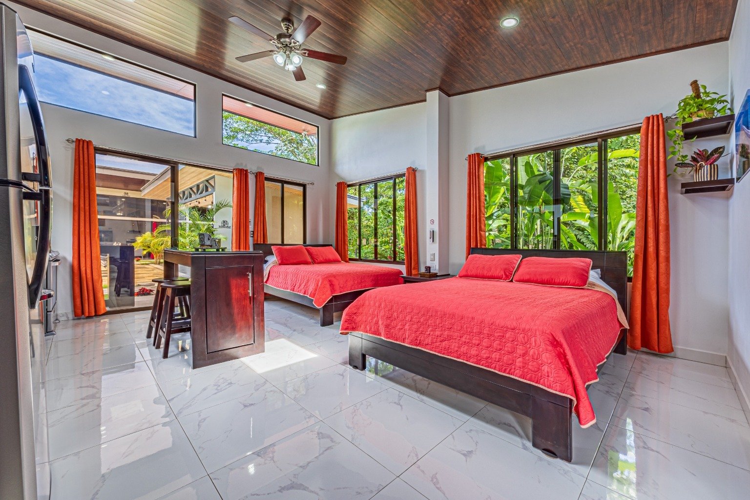 Incredible turnkey investment opportunity, 3 Rental villas, and a 2 Bedroom Home with a large pool.