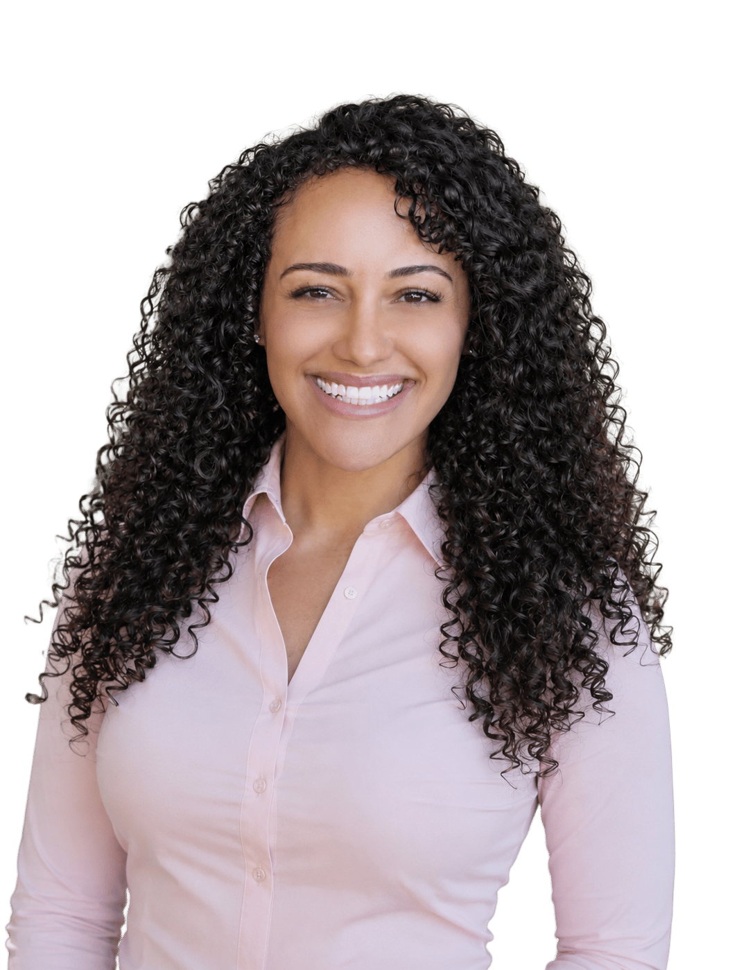 Kallee Brookes smiling in a pale pink shirt, with long dark curly hair.