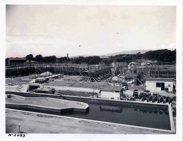Historic black and white photograph showing the zoo's original 1930s WPA-era buildings