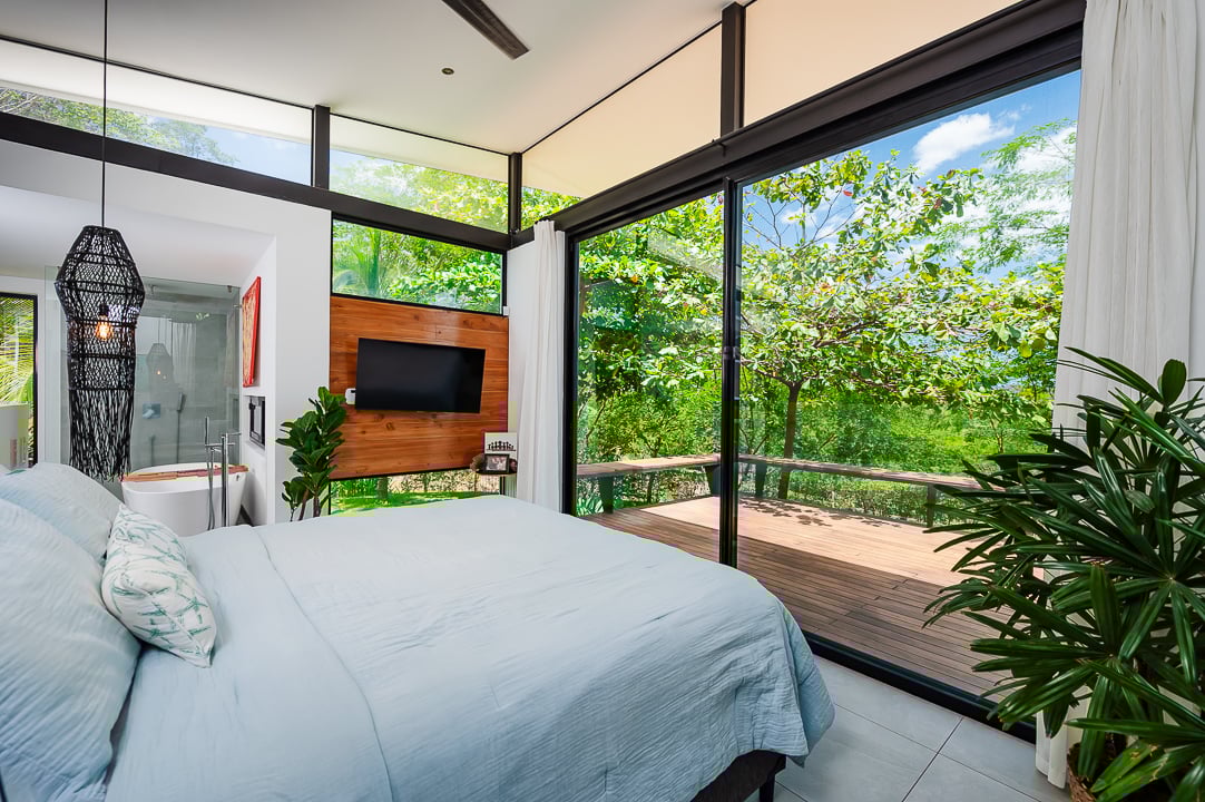 Casa Kalachuchi | Gorgeous Modern Jungle Oasis with Sunset Views in Gated Community