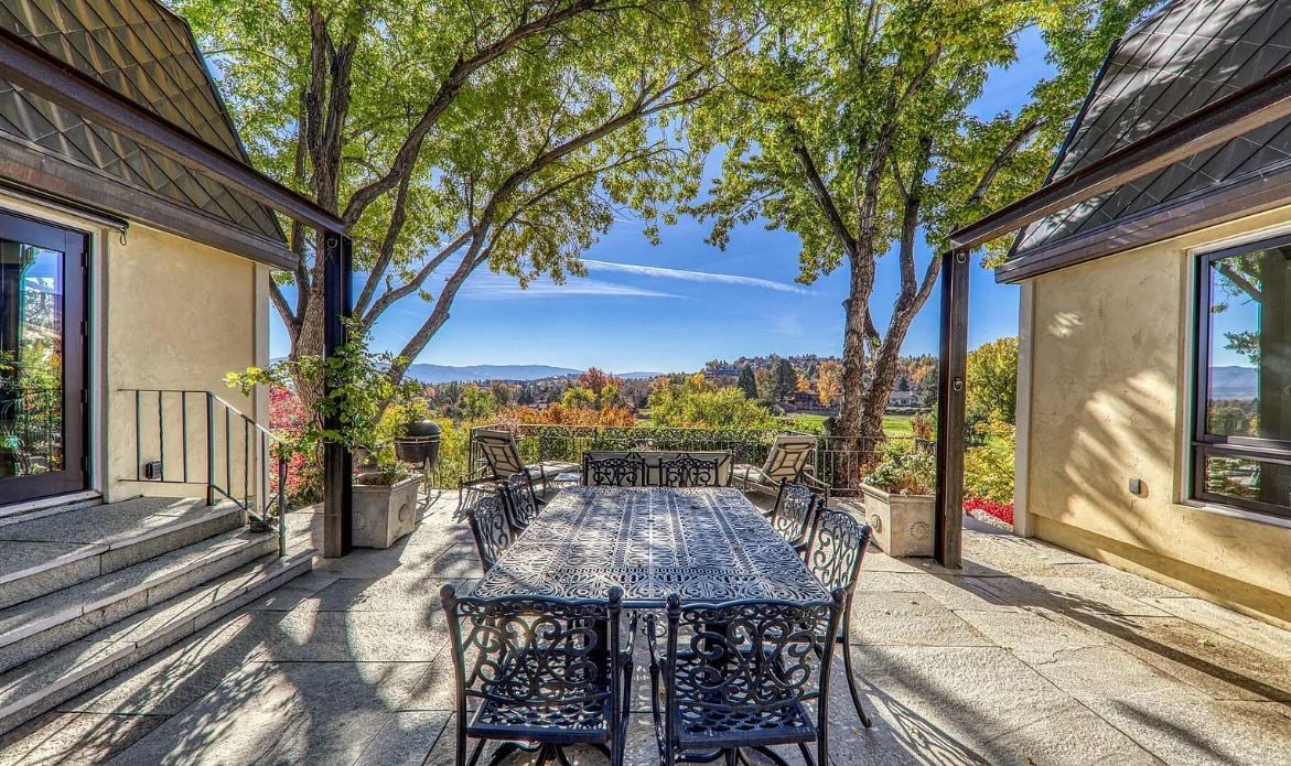 A French Country Manor in Lakeridge with Panoramic Mountain and Golf Course Views. For three generations, the Broili Estate has been cherished by one family—a residence imbued with timeless character, elegance, and a touch of whimsy. Set within Reno's prestigious Lakeridge community, enter a circular paver driveway and reflecting fountain, setting the stage for refined living.