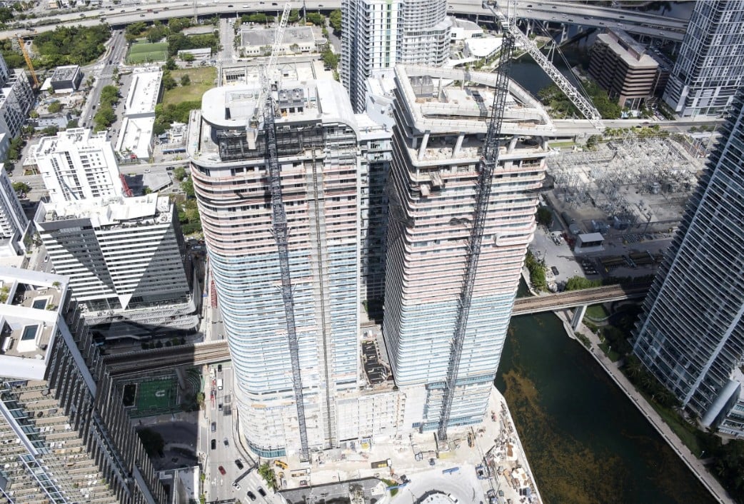 Newgard Group and Two Roads Development Mark Major Construction Milestone at One Brickell Riverfront With Installation of Architectural Crowns
