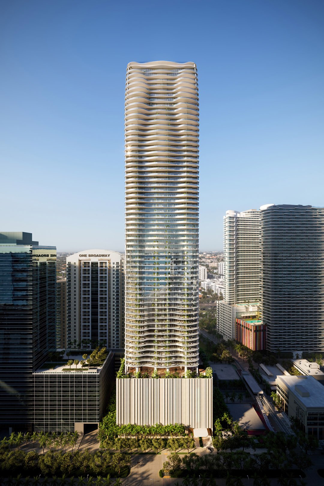 1428 Residences tower with flowing curved balconies rises above the Brickell skyline.