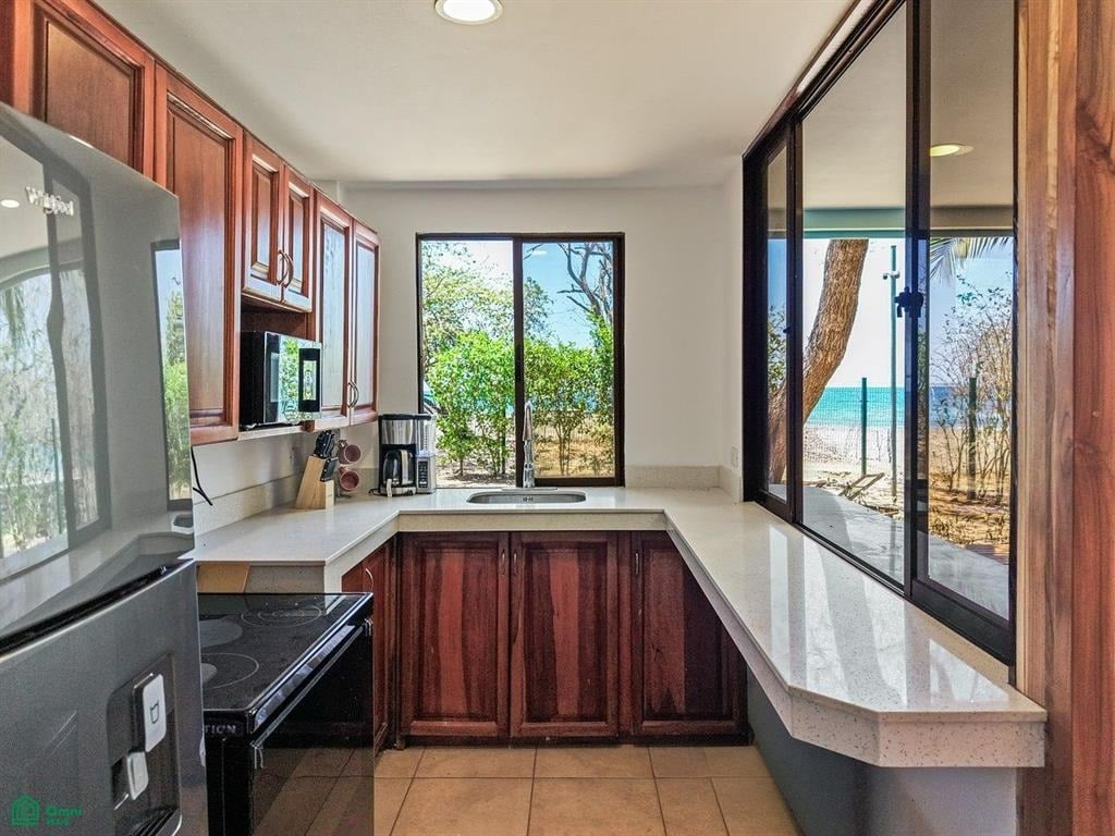 Botanikos | Rare Beachfront Property with Duplex in Playas del Coco