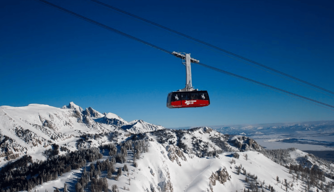 The Jackson Hole Mountain Resrot Tram making it's way up the mountain on a beautiful bluebird winter day