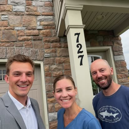 Aaron with Carolyn and Joe outside their home