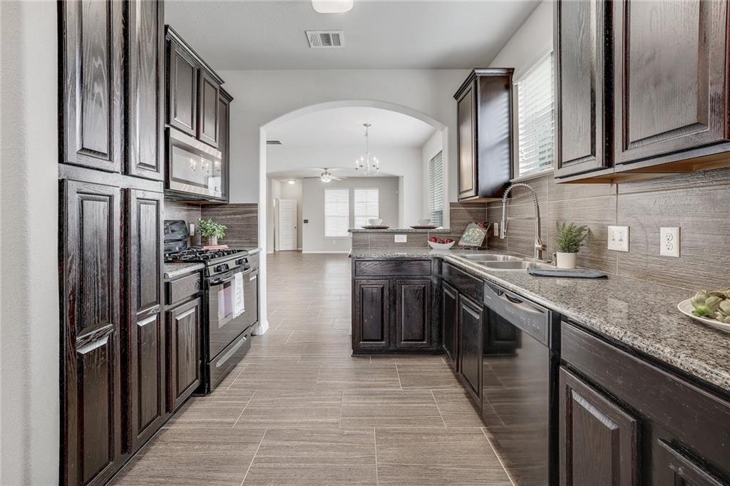 Modern Corner Lot Townhome in Coveted Carrington Court!